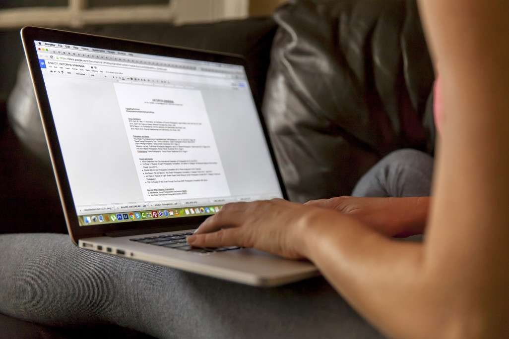 Is Typing a Motor Skill? An Overview on Typing Skills - Women typing on her laptop